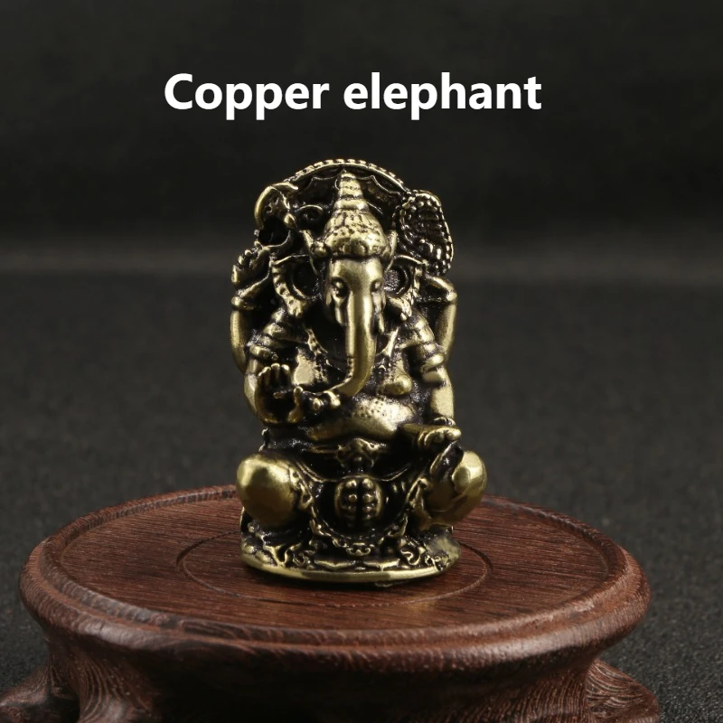 Thai Elephant God Bronze Elephant Nose God of Wealth Ancient Copper Crafts Decoration Collection Handheld Items
Thai Elephant God Bronze Elephant Nose God of Wealth Ancient Copper Crafts Decoration Collection Handheld Items