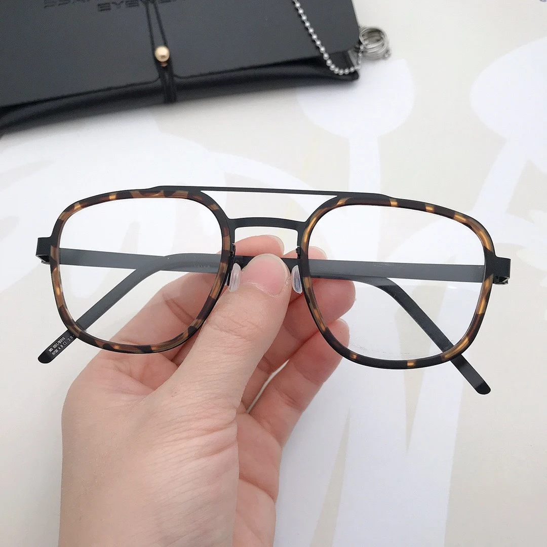 Denmark Brand 9738 Titanium Glasses Frame Men Ultralight Screwless Prescription Eyeglasses Women Double-Beam Optical Spectacles 
Denmark Brand 9738 Titanium Glasses Frame Men Ultralight Screwless Prescription Eyeglasses Women Double-Beam Optical Spectacles