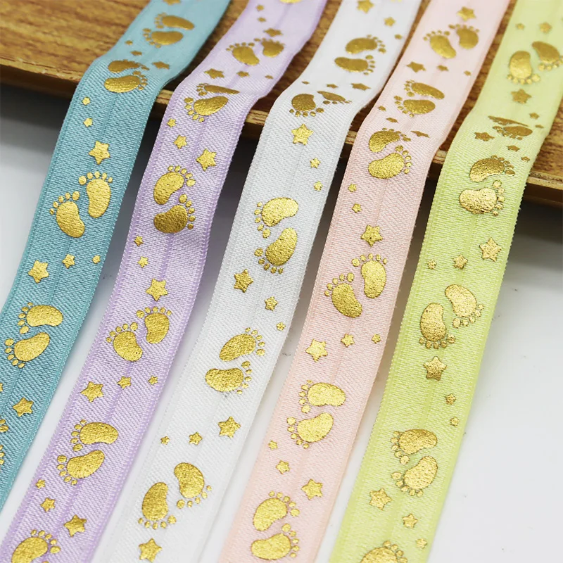 Wholesale 10Yard 5/8" 15mm Gold Foil Baby Footprints Print FOE Spandex Fold Over Elastic Ribbon For Headband Diy Sewing Trim
Wholesale 10Yard 5/8" 15mm Gold Foil Baby Footprints Print FOE Spandex Fold Over Elastic Ribbon For Headband Diy Sewing Trim
