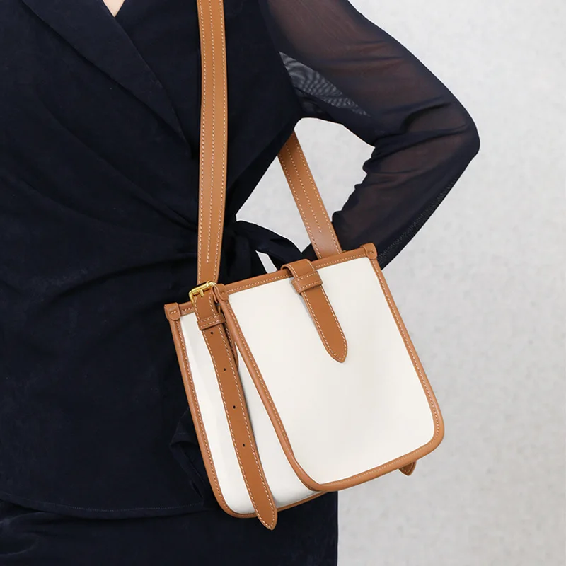 AFKOMS Elegant and unique crossbody bag Fashion-forward large capacity bucket bag with single shoulder strap
AFKOMS Elegant and unique crossbody bag Fashion-forward large capacity bucket bag with single shoulder strap