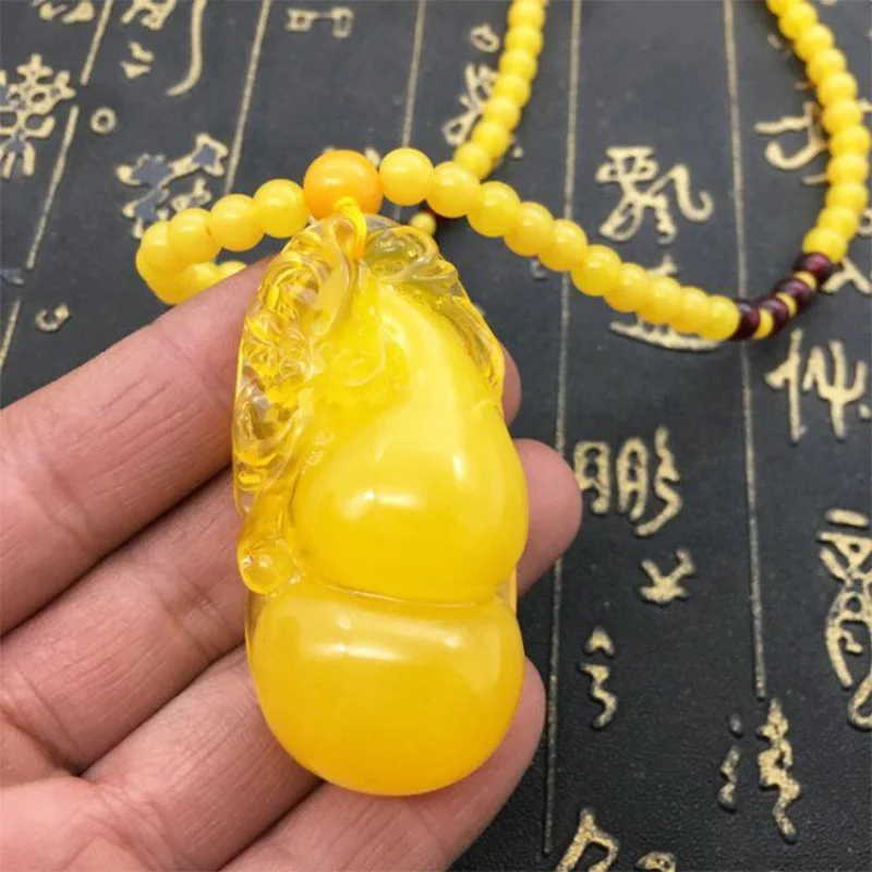 

Baltic Old Beeswax Calabash Pendent Yellow Chicken Grease Amber Necklace Fluorescent Men's and Women's Sweater Chain Long Craft
