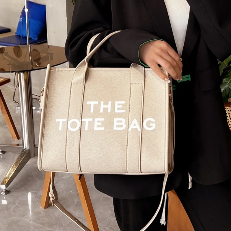 Women's Tote Bags New Leather Solid Color Symatic Bag Simple Outdoor Leisure Large -capacity Shoulder bag
Women's Tote Bags New Leather Solid Color Symatic Bag Simple Outdoor Leisure Large -capacity Shoulder bag