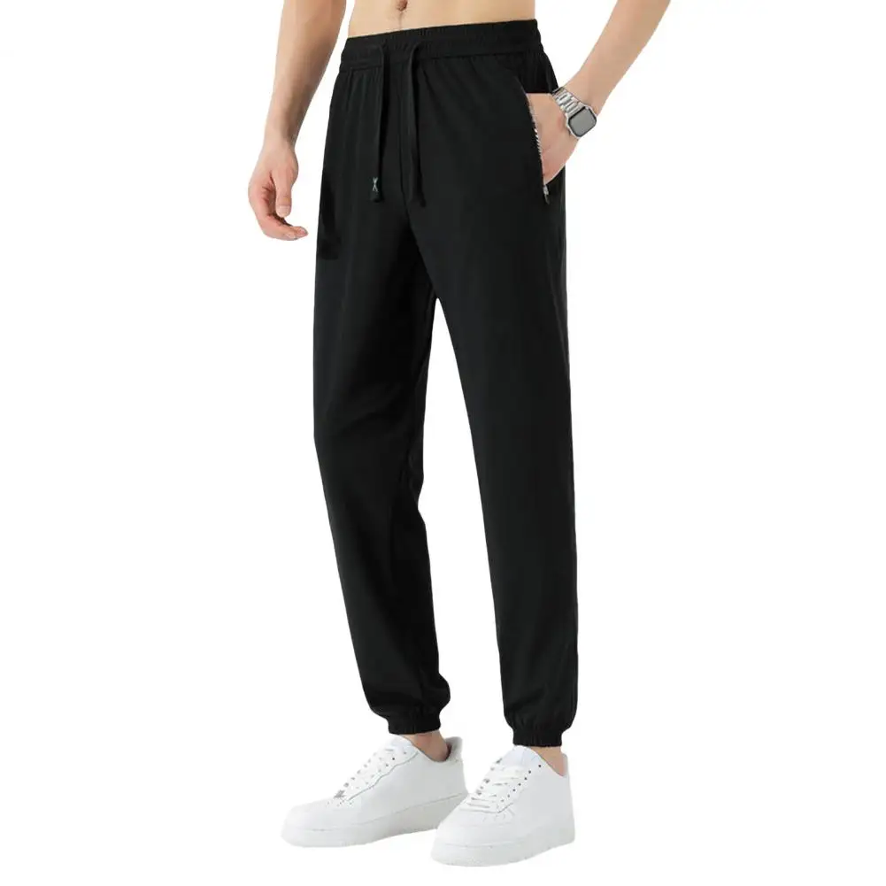 Cinched Leg Design Trousers Quick Dry Unisex Gym Sweatpants with Side Pockets Drawstring Waist Ice Silk Ankle-banded for Jogging
Cinched Leg Design Trousers Quick Dry Unisex Gym Sweatpants with Side Pockets Drawstring Waist Ice Silk Ankle-banded for Jogging