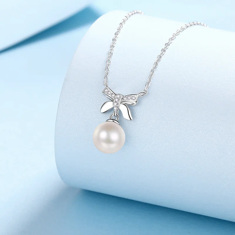 GJWJ Moissanite Pearl Pendant Necklace for Women Gift S925 Silver Romantic Natural Pearl Bowknot Necklace for Engagement Jewelry
GJWJ Moissanite Pearl Pendant Necklace for Women Gift S925 Silver Romantic Natural Pearl Bowknot Necklace for Engagement Jewelry