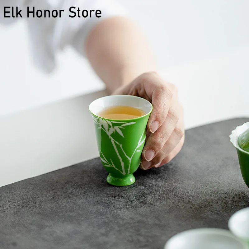 2pc/Set Yongzheng Green Ceramic Tea Cup Pure Hand-painted Bamboo Wind Bell Cup Smell Cup Master Cup Kung Fu Tea Set Gifts 65ml
2pc/Set Yongzheng Green Ceramic Tea Cup Pure Hand-painted Bamboo Wind Bell Cup Smell Cup Master Cup Kung Fu Tea Set Gifts 65ml
