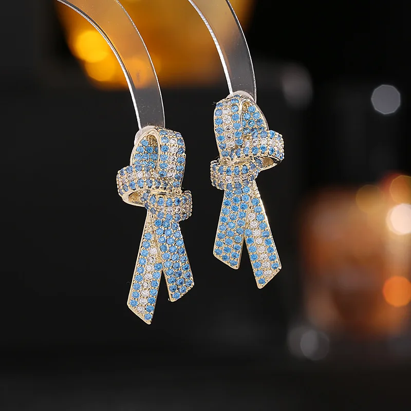 

S925 Silver Needle Fashionable Commuter Earrings With High Grade Feeling, Zircon Stone Inlaid 3D Ribbon Bow Earrings