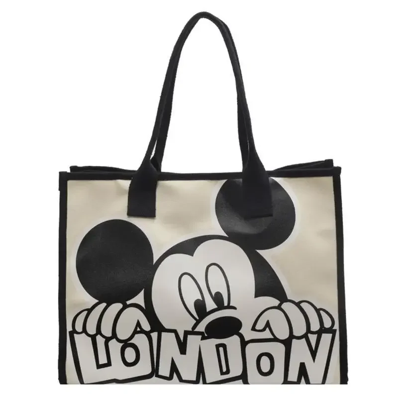 Mickey Disney Anime Canvas Shoulder Bag New Commuter Fashion Tote Bag Large Capacity Handbag Mommy Bags Black White Color Gift
Mickey Disney Anime Canvas Shoulder Bag New Commuter Fashion Tote Bag Large Capacity Handbag Mommy Bags Black White Color Gift