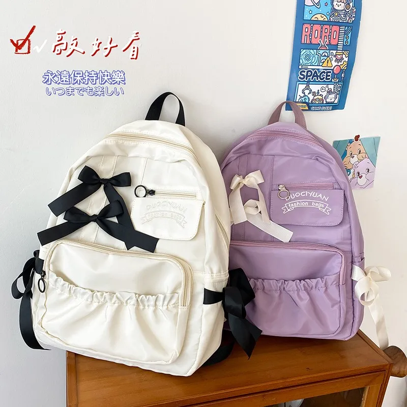 

Women Japanese Sweet Backpack Ladies Cute Hit Color Bow Large Capacity Travel Mochila College Style Student School Bag
