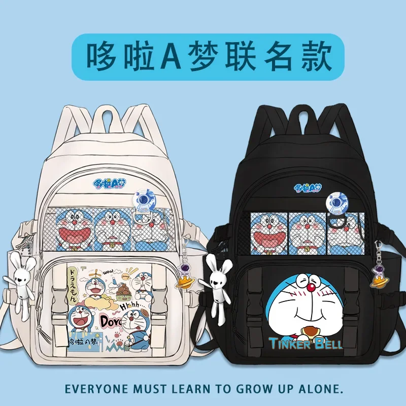 

Doraemon милый школьный рюкзак с героями мультфильмов для учеников первого класса до пятого класса модный рюкзак для учеников младшей и старшей школы