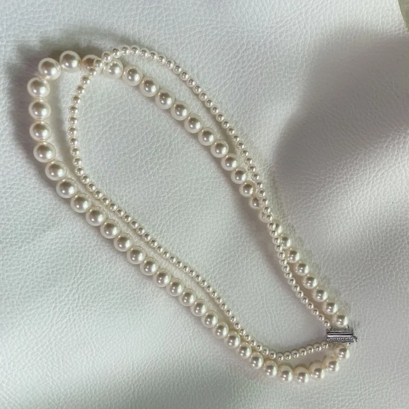 LONDANY necklace Double layered pearl necklace with premium sweater chain necklace
LONDANY necklace Double layered pearl necklace with premium sweater chain necklace