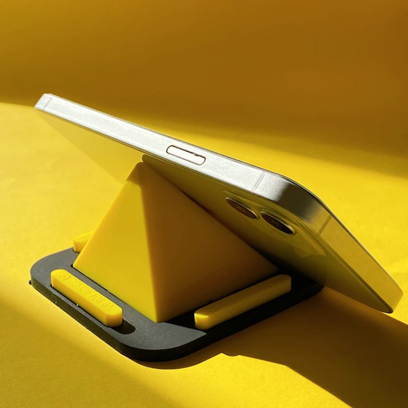 

Простая, практичная, милая и маленькая силиконовая подставка для просмотра в виде пирамиды для мобильных телефонов iPad планшетов ленивый офисный Противоскользящий силикон