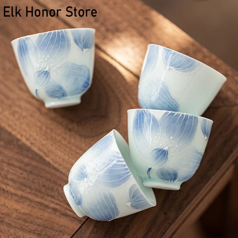 

2pc Hand Painted Art Ceramic Teacup White Porcelain Kung Fu Tea Small Single Master Cup Engrave Lotus Tea Bowl Drinkware Chazhan