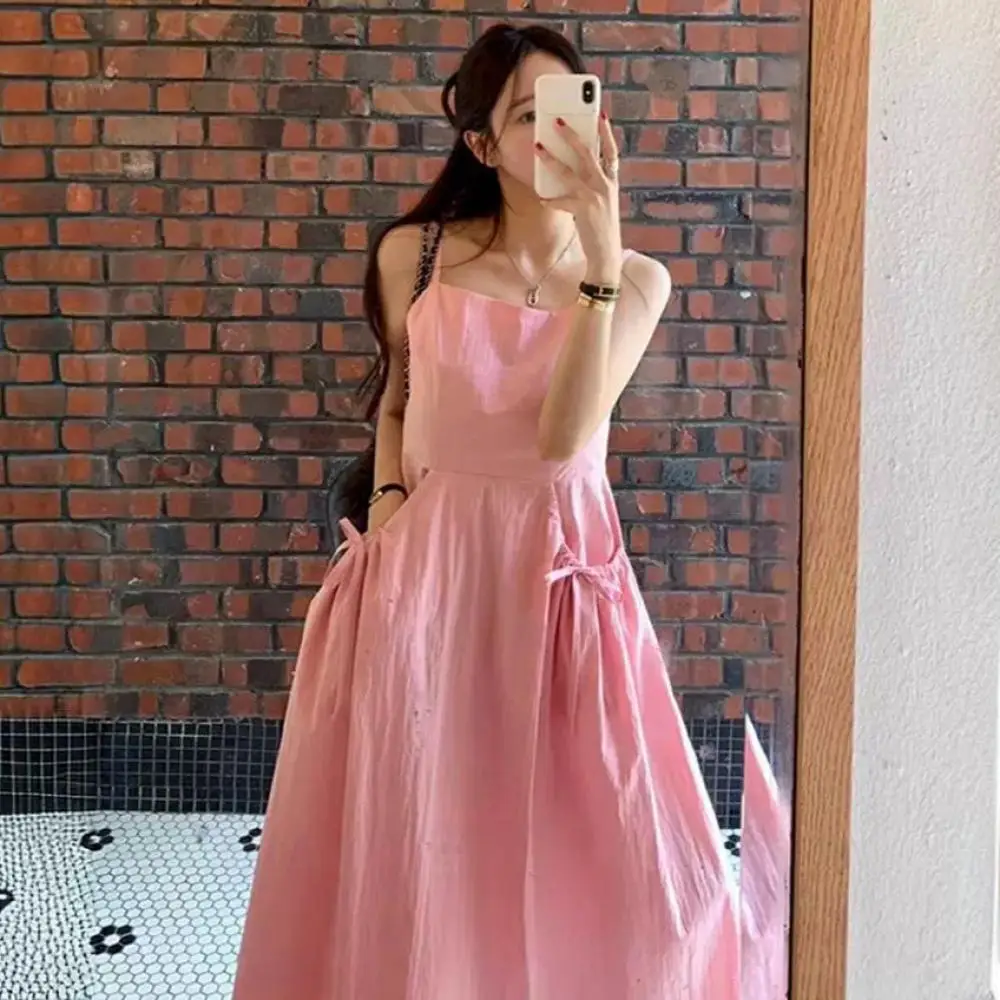 Women Pink Sleeveless Bow Tie Loose Dress Elegant Solid Colour Backless Dresses 2024 Summer New French Style Sexy Party Dress
Women Pink Sleeveless Bow Tie Loose Dress Elegant Solid Colour Backless Dresses 2024 Summer New French Style Sexy Party Dress