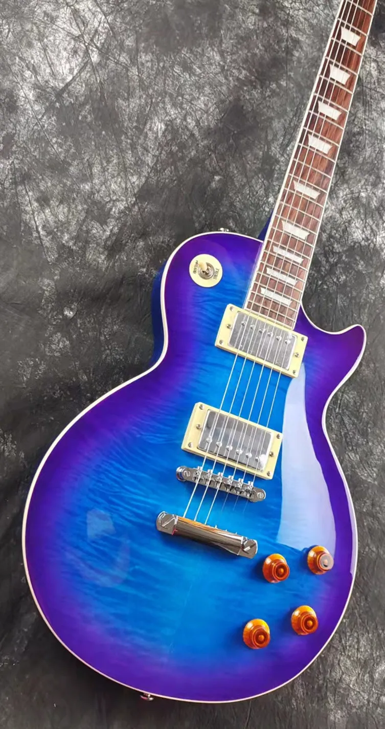 Electric guitar, mahogany, blueberry color gradient, tiger pattern, imported paint, stock, quick package
Electric guitar, mahogany, blueberry color gradient, tiger pattern, imported paint, stock, quick package
