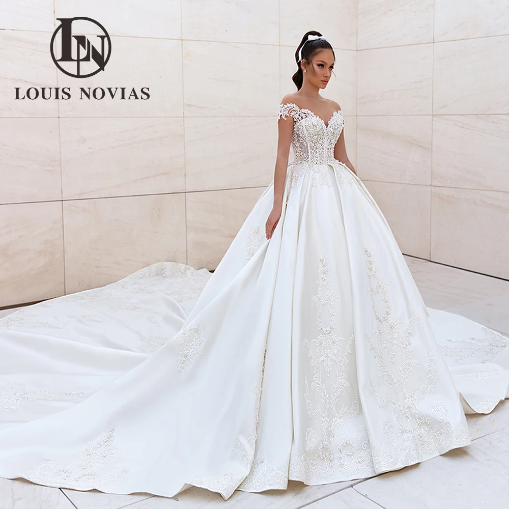 LOUIS NOVIAS Ball Gown Wedding Dress 2022 Off Shoulder Bride Dresses Luxury Beading Appliques Princess Long Tail Bridal Gown
LOUIS NOVIAS Ball Gown Wedding Dress 2022 Off Shoulder Bride Dresses Luxury Beading Appliques Princess Long Tail Bridal Gown