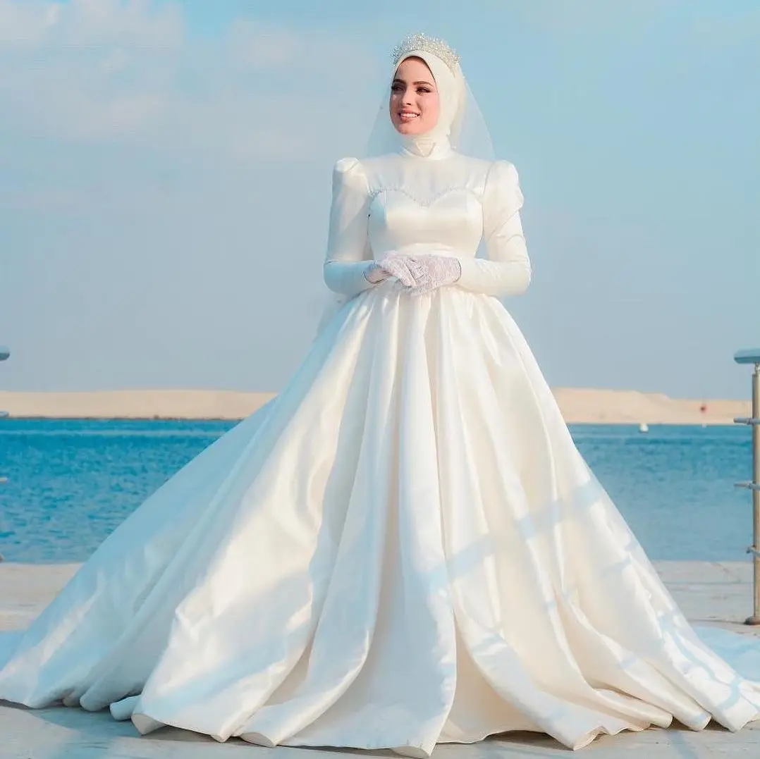 Princess Muslim Wedding Dresses for Bride High Neck Long Sleeves Sweep Train Beading Satin Bridal Gowns Hijab robes de mariee
Princess Muslim Wedding Dresses for Bride High Neck Long Sleeves Sweep Train Beading Satin Bridal Gowns Hijab robes de mariee