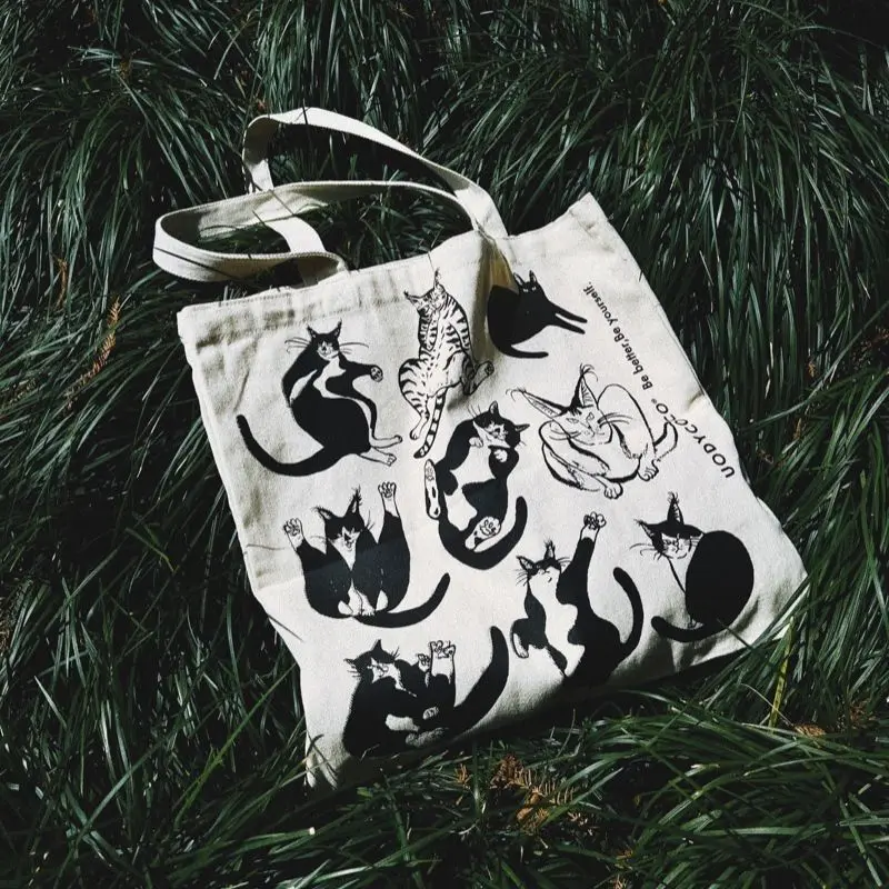 Korean Cat Printed Canvas Shoulder Bag Large Capacity Casual Portable Reusable Shopping Bag Side Bag for Ladies Designer Bag
Korean Cat Printed Canvas Shoulder Bag Large Capacity Casual Portable Reusable Shopping Bag Side Bag for Ladies Designer Bag