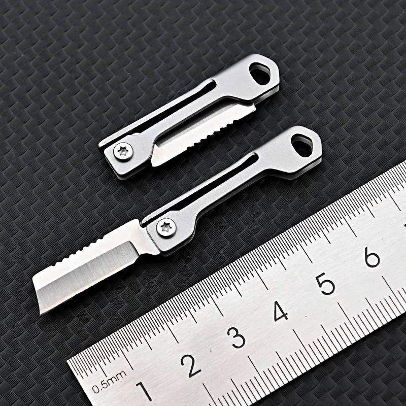 1Pc Stainless Steel Folding Knife Mini Square Head Multi-function Pocket Knife Keychain Pendant Outdoor Camping Supplies
1Pc Stainless Steel Folding Knife Mini Square Head Multi-function Pocket Knife Keychain Pendant Outdoor Camping Supplies