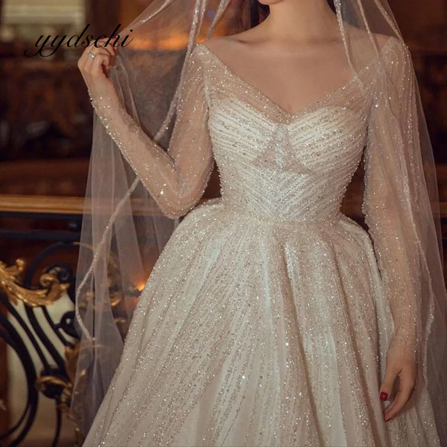 Beading Wedding Dress Exquisite Bridal Floor Length Sexy Sparkly Crystal Lace Illusion V-Neck Tulle Court Train Dress for Women
Beading Wedding Dress Exquisite Bridal Floor Length Sexy Sparkly Crystal Lace Illusion V-Neck Tulle Court Train Dress for Women
