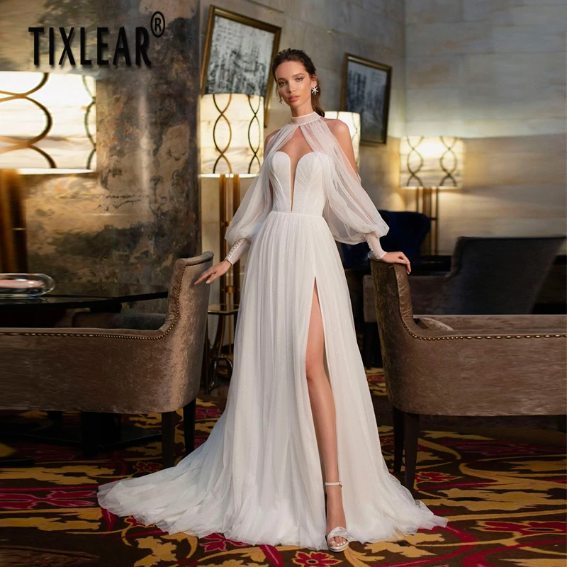 TIXLEAR Ivory Simple A-LINE Court Train Tulle Wedding Dress Sequins Puff Sleeves Pleat vestidos de novia robes de mariées
TIXLEAR Ivory Simple A-LINE Court Train Tulle Wedding Dress Sequins Puff Sleeves Pleat vestidos de novia robes de mariées