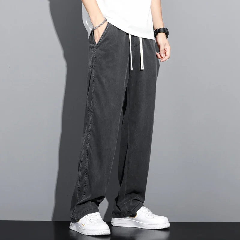 

Летние мягкие мужские джинсы Lyocell из ткани на шнуровке с эластичным поясом, корейские повседневные брюки, тонкие свободные прямые брюки