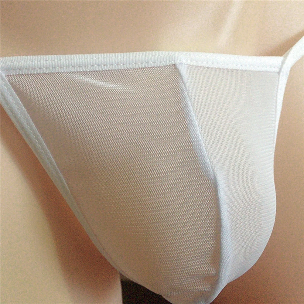 Male See Through G-String Sexy Underwear Elastic Thongs T-Back Briefs Flirt Tease Underpants Scrotum Panties Cock Bulge
Male See Through G-String Sexy Underwear Elastic Thongs T-Back Briefs Flirt Tease Underpants Scrotum Panties Cock Bulge