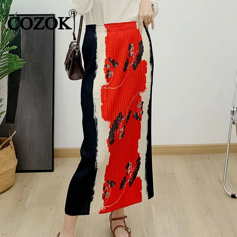 

COZOK Women Spring New Style Stripe Stitching Contrast Color High Waisted Temperament Slim Casual Broken Hole Skirt WT5029