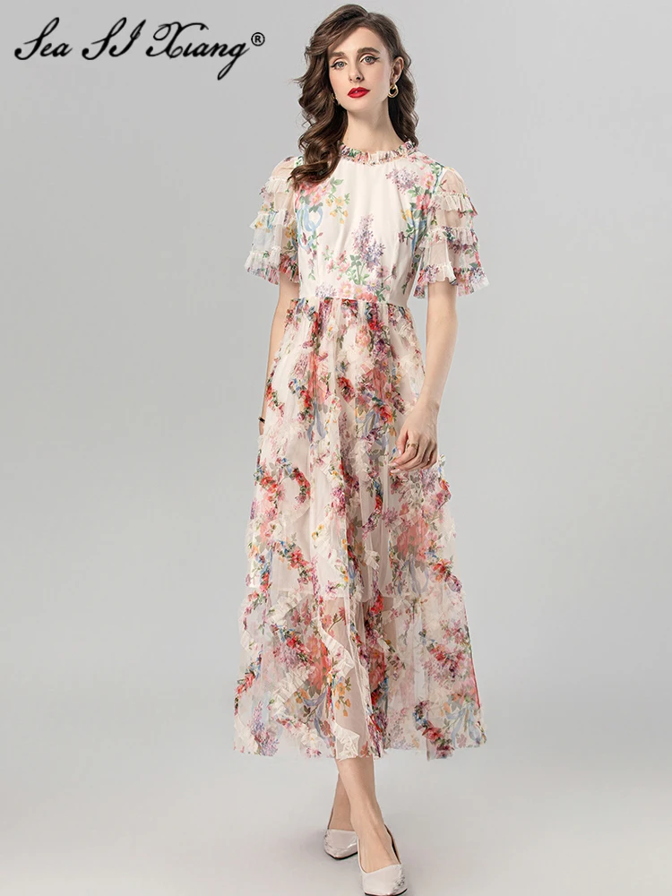 Женское длинное Сетчатое платье Seasixiang, летнее элегантное дизайнерское платье с круглым вырезом, коротким рукавом, оборками и цветочным принтом
Женское длинное Сетчатое платье Seasixiang, летнее элегантное дизайнерское платье с круглым вырезом, коротким рукавом, оборками и цветочным принтом