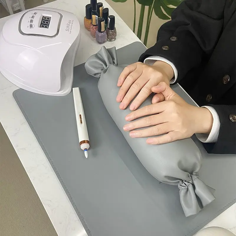 Cute Candy Shaped Manicure Hand Pillows Light Luxury High-End Leather Anti Fouling Tablemat Special Tools for Nail Art Salons
Cute Candy Shaped Manicure Hand Pillows Light Luxury High-End Leather Anti Fouling Tablemat Special Tools for Nail Art Salons