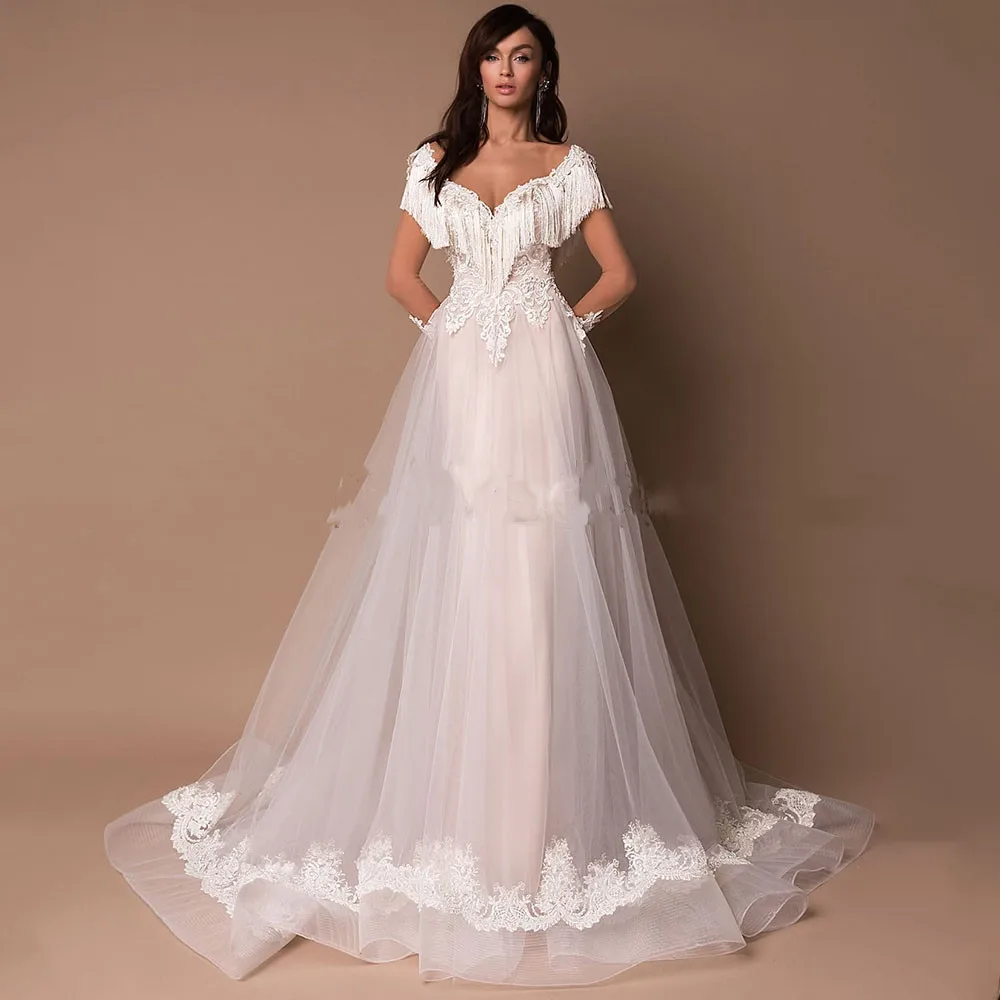 Behomian V-Neck Wedding Dress 2023 Lace Appliques Tassel Cap Sleeve Backless Court Train Bridal Gowns Robes De Marie Soft Tulle
Behomian V-Neck Wedding Dress 2023 Lace Appliques Tassel Cap Sleeve Backless Court Train Bridal Gowns Robes De Marie Soft Tulle