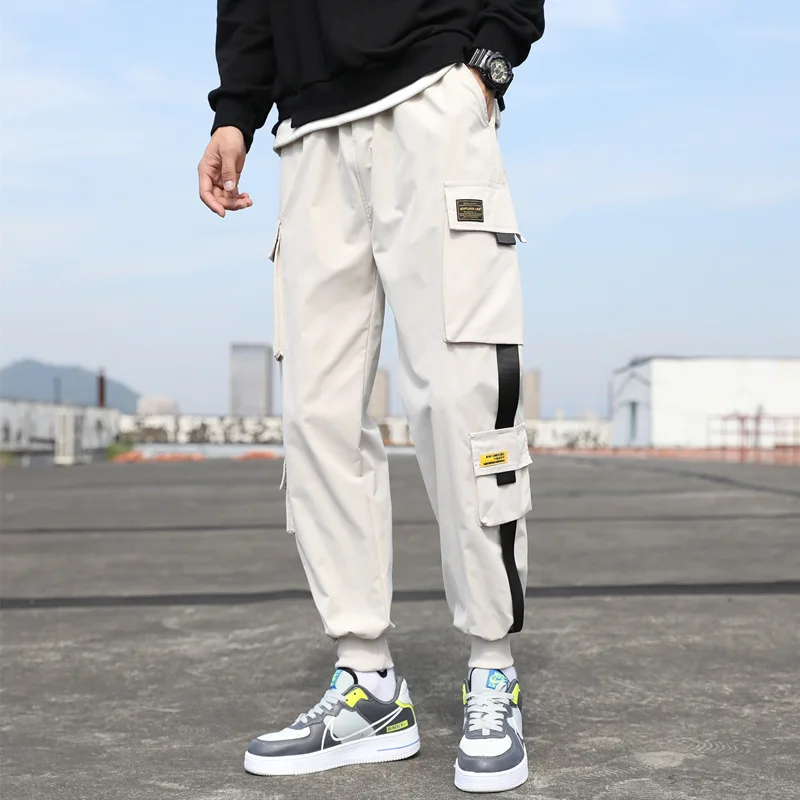 Thin Streetwear Casual Pants Men Ribbons Harem Jogging Pants Male Slim Fit Spring Cargo Pants Multi-Pockets Women Trouser
Thin Streetwear Casual Pants Men Ribbons Harem Jogging Pants Male Slim Fit Spring Cargo Pants Multi-Pockets Women Trouser
