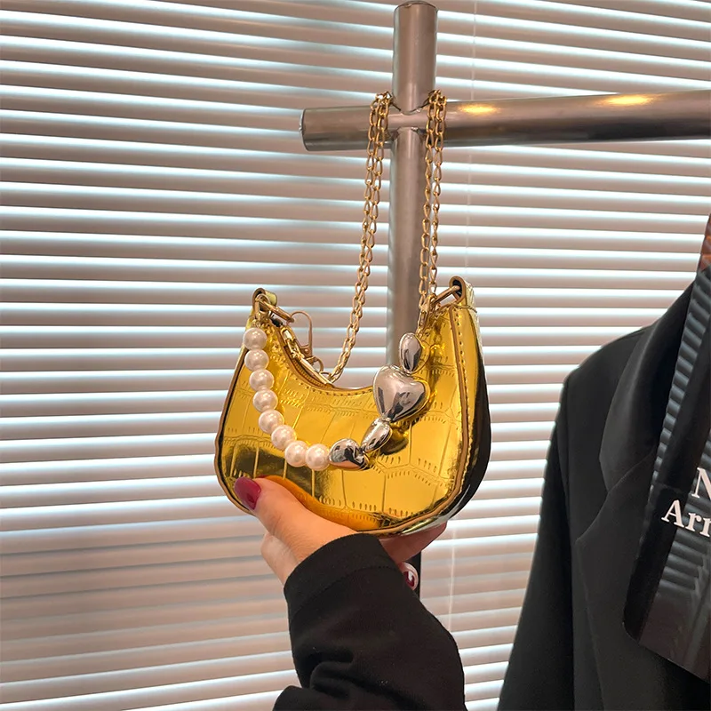 Retro Laser Women Shoulder Bag Leather Mini Dumpling Crossbody Bag Luxury Designer Small Pearl Chain Handbag Crescent Saddle Bag
Retro Laser Women Shoulder Bag Leather Mini Dumpling Crossbody Bag Luxury Designer Small Pearl Chain Handbag Crescent Saddle Bag