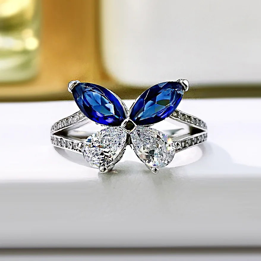 Серебряное кольцо S925, инкрустированное бабочкой из циркония, универсальное модное кольцо в европейском и американском стиле, бутиковые ювелирные изделия для женщин
Серебряное кольцо S925, инкрустированное бабочкой из циркония, универсальное модное кольцо в европейском и американском стиле, бутиковые ювелирные изделия для женщин