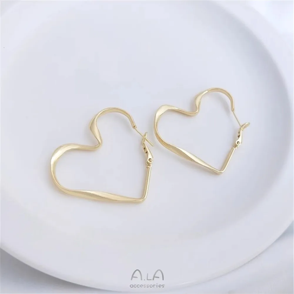 14K Gold Fashion Twisted Ribbon Heart-shaped Earrings 925 Silver Needle Love Spring Buckle Ear Pin Ear Accessories E258
14K Gold Fashion Twisted Ribbon Heart-shaped Earrings 925 Silver Needle Love Spring Buckle Ear Pin Ear Accessories E258