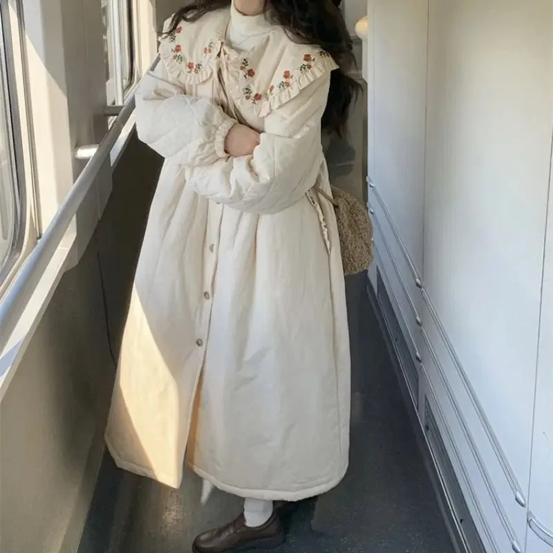 Vintage Mori Girl Embroidery Winter Jacket Women Japanese Kawaii Peter Pan Collar Oversized Cotton Linen Coat Warm Loose Parkas
Vintage Mori Girl Embroidery Winter Jacket Women Japanese Kawaii Peter Pan Collar Oversized Cotton Linen Coat Warm Loose Parkas