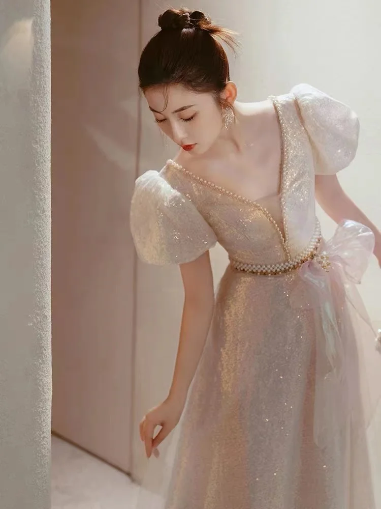 Evening Dress Shiny Golden Beading Deep V-Neck Empire Waist Short Sleeve Elegant Retro Fairy Princess Celebrity Party Prom Gown
Evening Dress Shiny Golden Beading Deep V-Neck Empire Waist Short Sleeve Elegant Retro Fairy Princess Celebrity Party Prom Gown