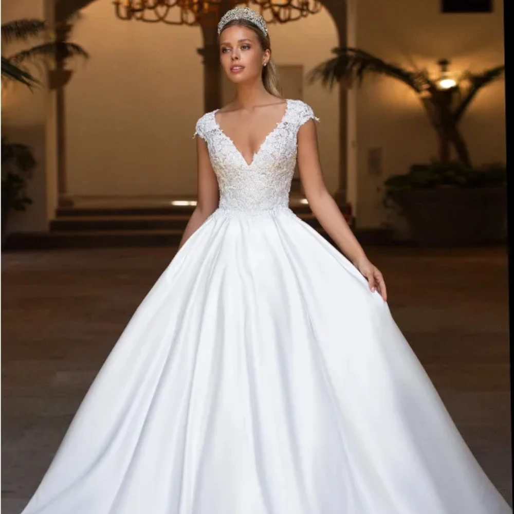 2024 Luxury New Product Satin Wedding Dresses Cap Sleeve Sexy V Neck Boho Bride Dresses Princess Wedding Gown Vestido de novia
2024 Luxury New Product Satin Wedding Dresses Cap Sleeve Sexy V Neck Boho Bride Dresses Princess Wedding Gown Vestido de novia