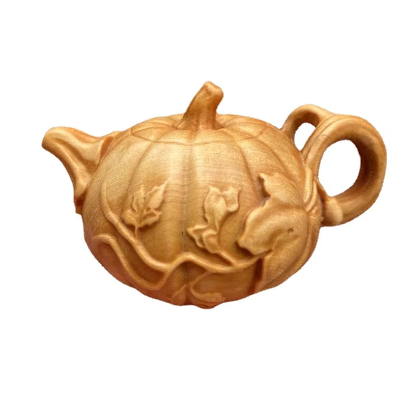 Carvings of cliff cedar wood handle pot pumpkin plum tea pot hand play a boxwood carved tea pet adornment piece play piece
Carvings of cliff cedar wood handle pot pumpkin plum tea pot hand play a boxwood carved tea pet adornment piece play piece