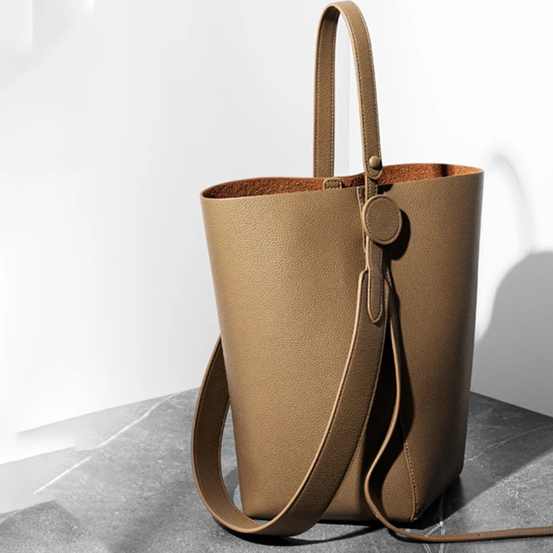 

2023 New Niche Design Cowhide Bucket Bag New Tote Bag Single Shoulder Diagonal Span Bag Female Exact Replica Luxury Brand Bags