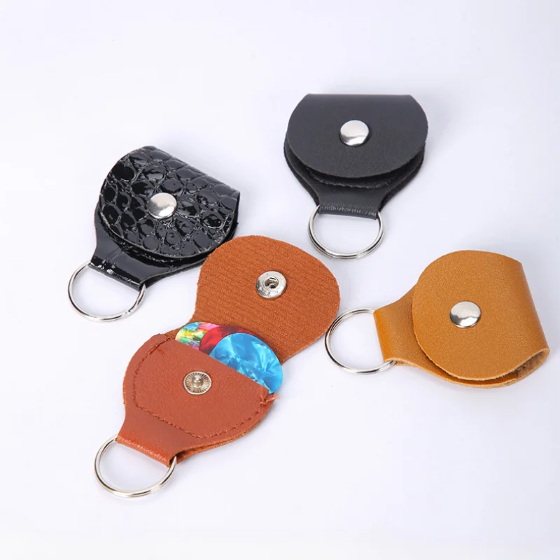 Держатель для гитары, брелок, кожаный мешочек для хранения Plectrum, Женский органайзер для электрической гитары, бас-укулеле
Держатель для гитары, брелок, кожаный мешочек для хранения Plectrum, Женский органайзер для электрической гитары, бас-укулеле