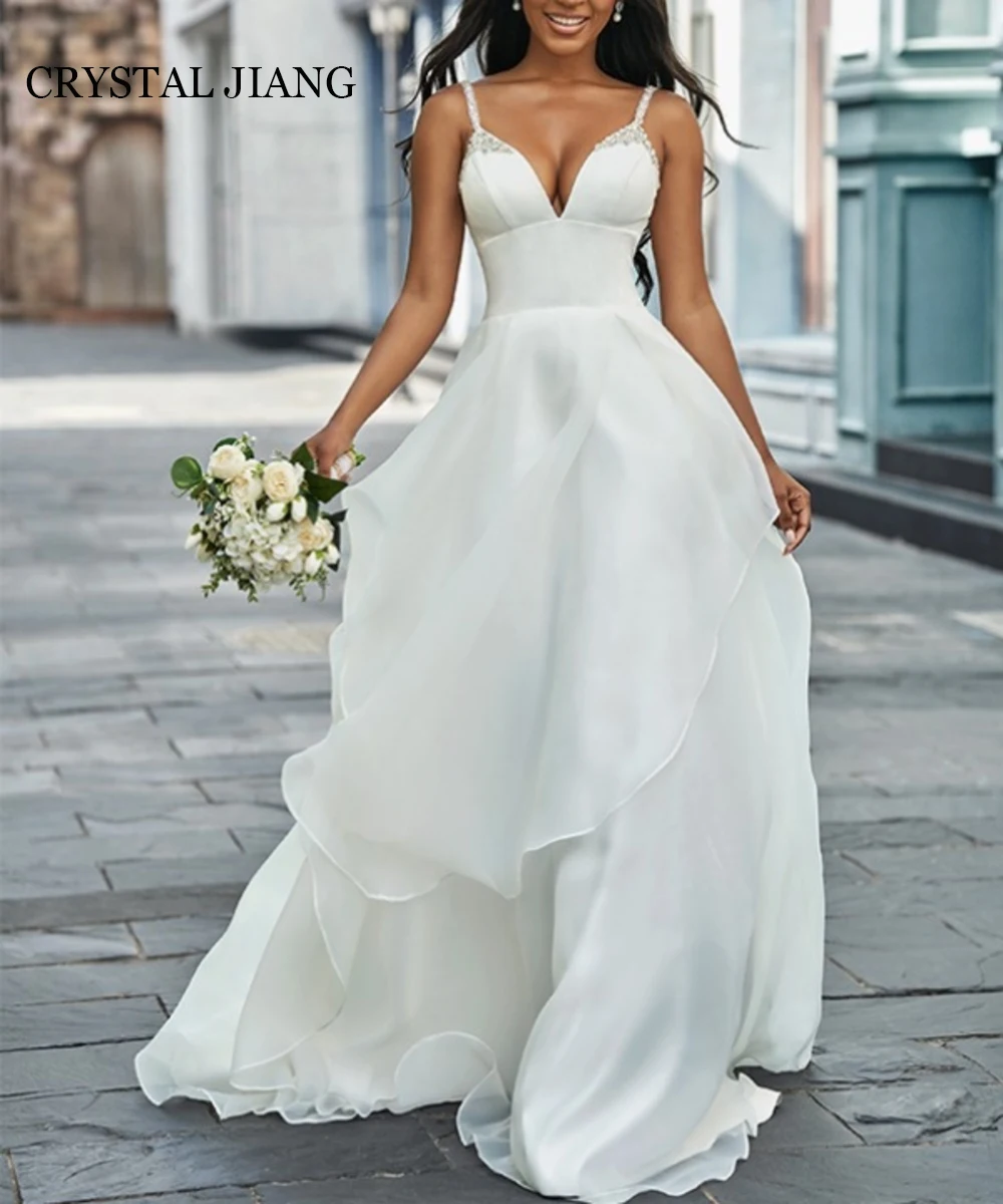 Elegant Long V Neck Organza Wedding Dresses Sleeveless with Beading A Line Floor Length فستان حفلات الزفاف Bridal Gowns
Elegant Long V Neck Organza Wedding Dresses Sleeveless with Beading A Line Floor Length فستان حفلات الزفاف Bridal Gowns