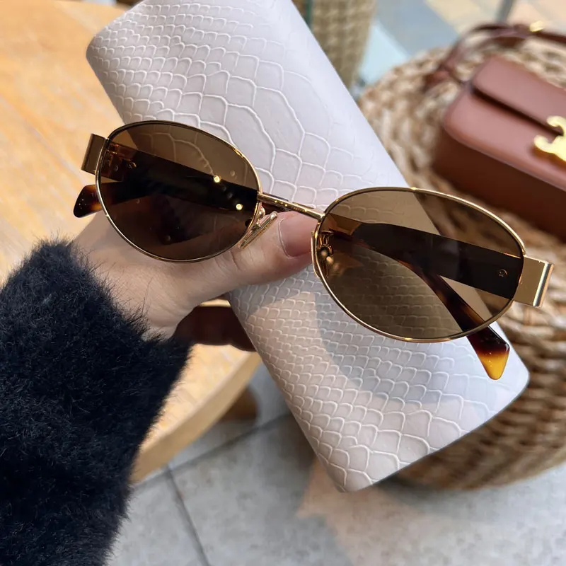 

24 Arc de Triomphe lisa glasses oval personality metal frame sunglasses female retro sunglasses tide simple avant-garde gorgeous