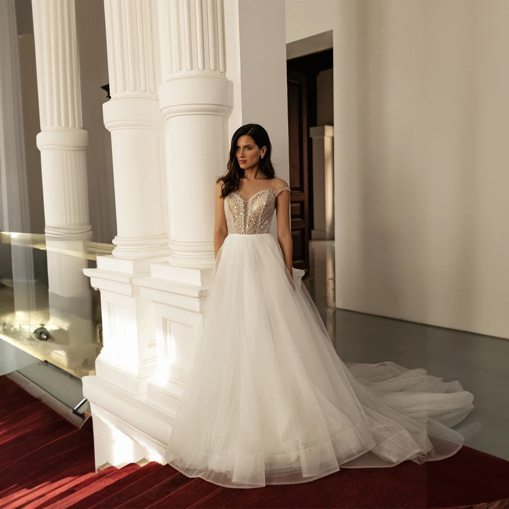 Scoop Neck See Through Corset Wedding Dress for Women Beads Crystal Wedding Gown A-line Court Illouion Birdal Gown robes de
Scoop Neck See Through Corset Wedding Dress for Women Beads Crystal Wedding Gown A-line Court Illouion Birdal Gown robes de