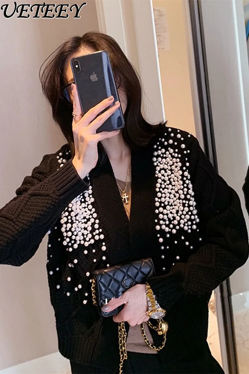 High Quality Heavy Industry Pearl Beaded Short Knitted Cardigan Sweater Women Socialite Temperament V-neck Wool Sweater Coat
High Quality Heavy Industry Pearl Beaded Short Knitted Cardigan Sweater Women Socialite Temperament V-neck Wool Sweater Coat