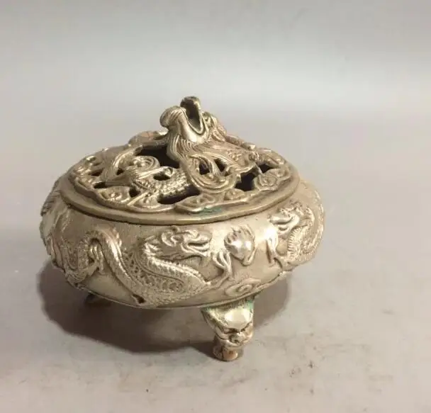 

Collectible archaize white copper nine dragon Incense burner