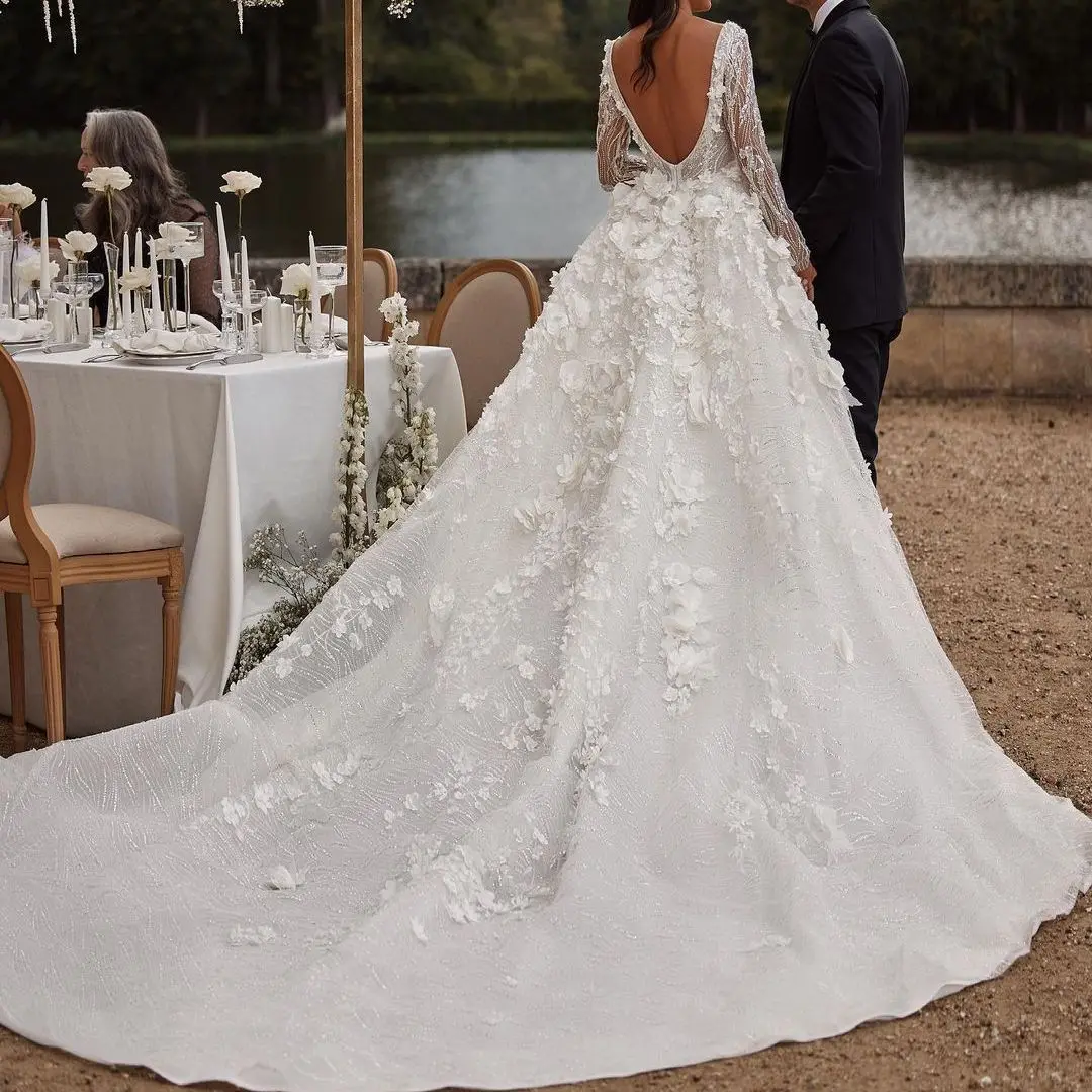 FATAPAESE Sparkling Floral Lace Applique Bodice with a Plunging V-neckline and Open Back Fully Embroidered Wedding Gown
FATAPAESE Sparkling Floral Lace Applique Bodice with a Plunging V-neckline and Open Back Fully Embroidered Wedding Gown