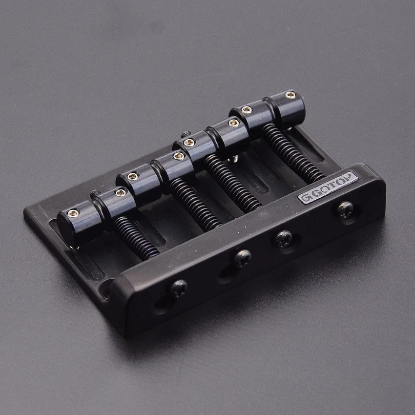 1 Set 4 Strings Brass Saddle Genuine Original GOTOH 201B-4 Electric Bass Bridge ( Black )
1 Set 4 Strings Brass Saddle Genuine Original GOTOH 201B-4 Electric Bass Bridge ( Black )