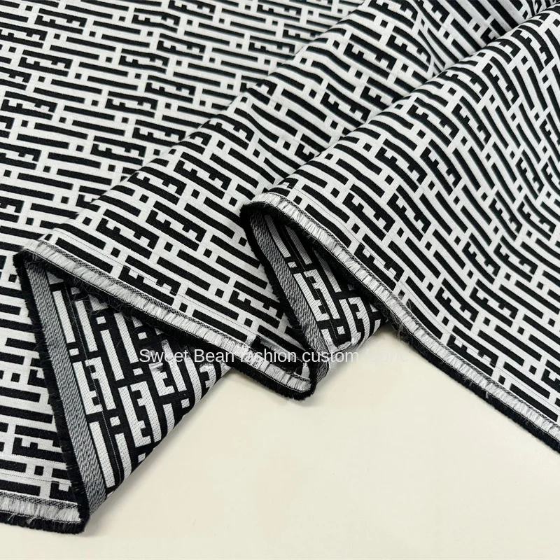 

Черно-белая тканая жаккардовая парчовая Ткань для шитья костюмов курток Модный комплект ветровок ткань из полиэстера оптовая продажа