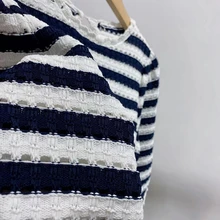 2022 Spring and Summer New Horizontal Striped Hollow Puff Sleeve Round Neck Sweater 2022 Spring and Summer New Horizontal Striped Hollow Puff Sleeve Round Neck Sweater