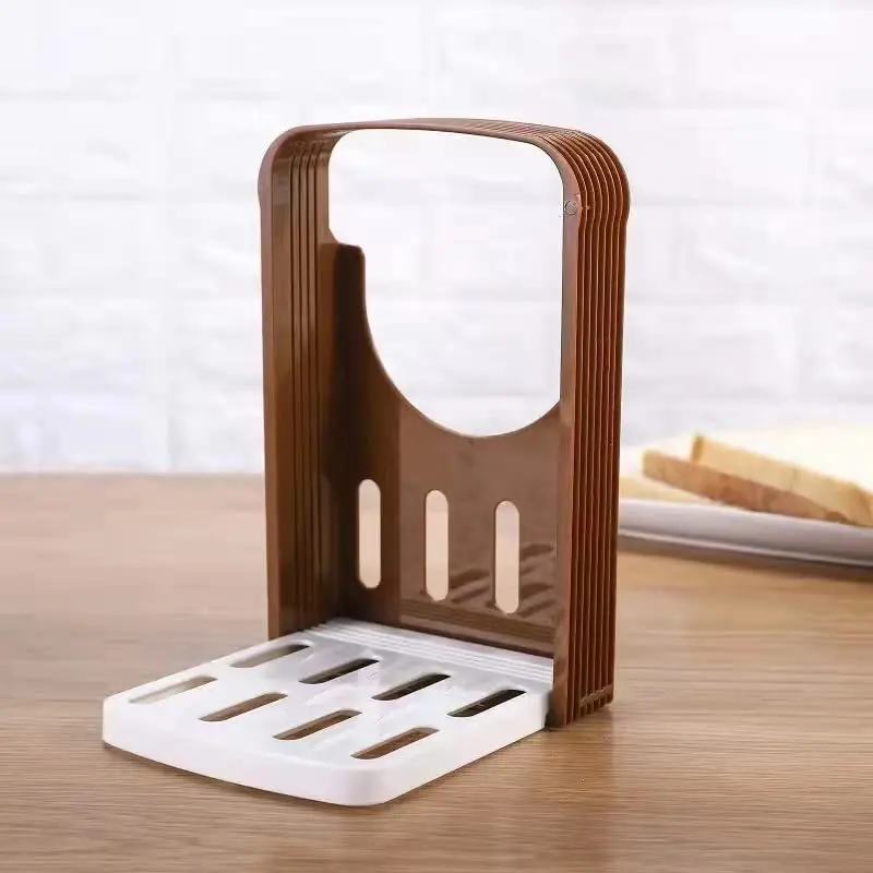 Kitchen Bread Slicer for Foldable Bread Toast Cutter Bagel Loaf Sandwich Slicing Guide Practical Plastic Bread Cutting Mold
Kitchen Bread Slicer for Foldable Bread Toast Cutter Bagel Loaf Sandwich Slicing Guide Practical Plastic Bread Cutting Mold